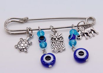 როგორ უნდა ატაროთ ქინძისთავი, რომ წარმატება, სიყვარული, ფული მოიზიდოთ და თავი დაიცვათ